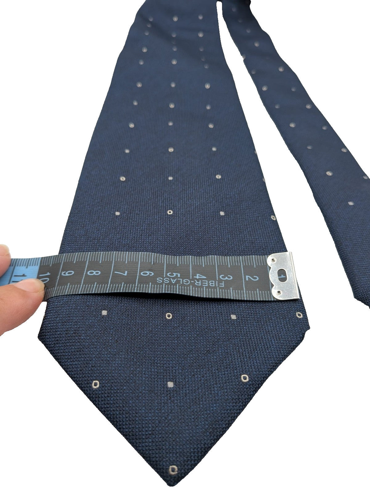 Hugo Parsons navy tie with geometric beige polka dot pattern, handmade in Italy.