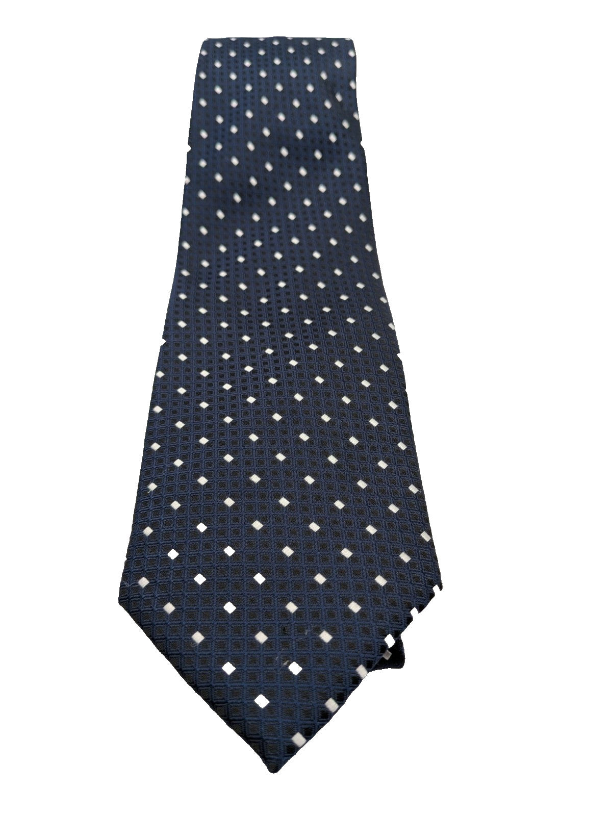 Uomo navy necktie with jacquard polka dot pattern and classic pointed style.