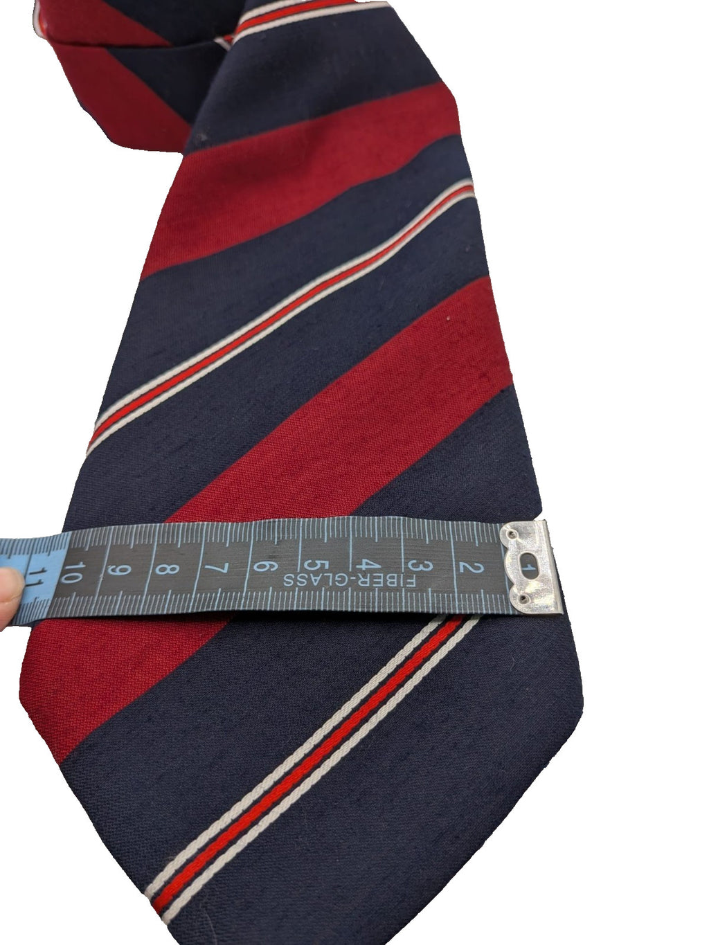 Blazer necktie navy with regimental diagonal stripes in blue, burgundy, white, and red.