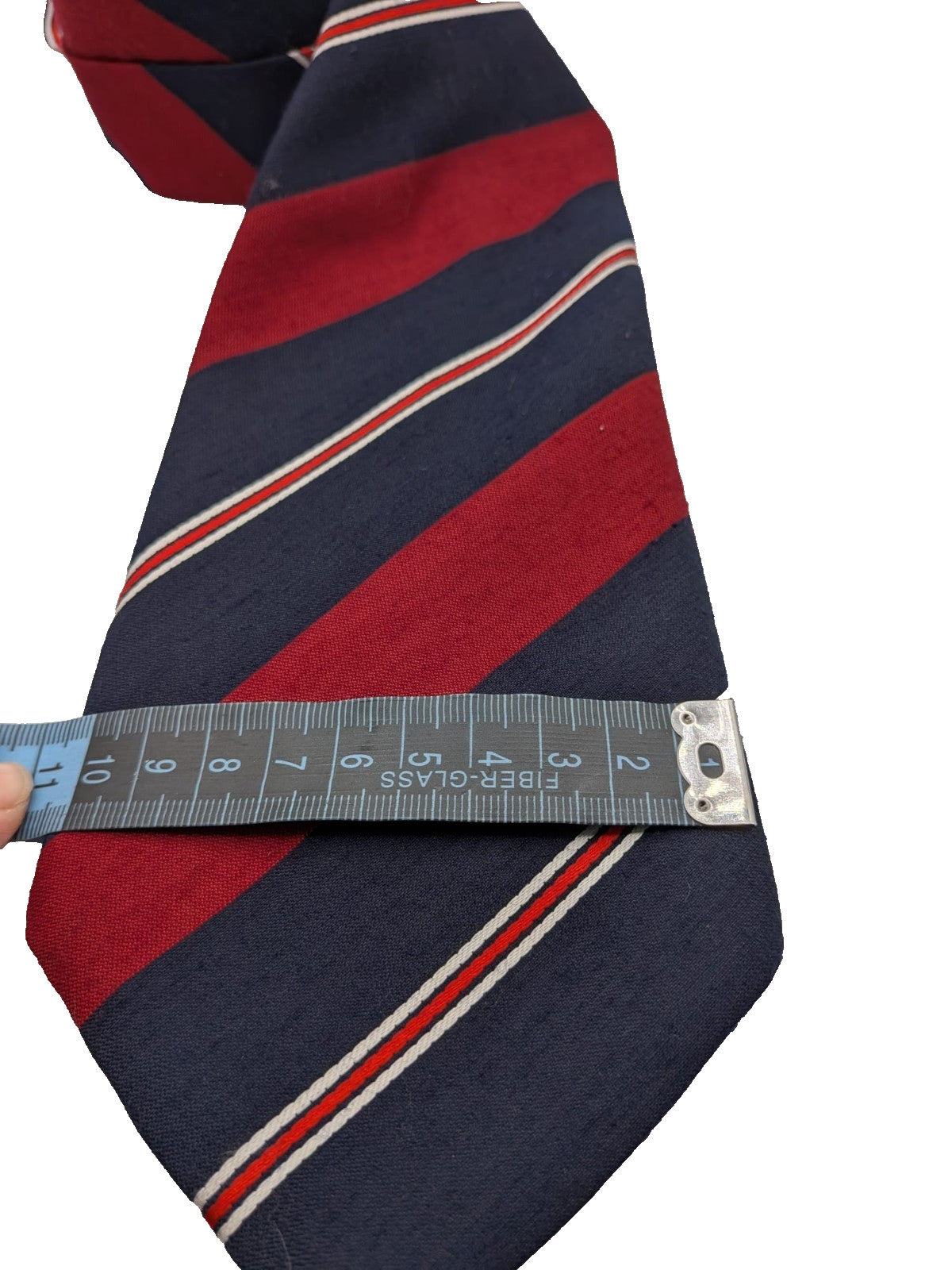 Blazer necktie navy with regimental diagonal stripes in blue, burgundy, white, and red.
