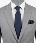 Hugo Parsons navy tie with geometric beige polka dot pattern, handmade in Italy.