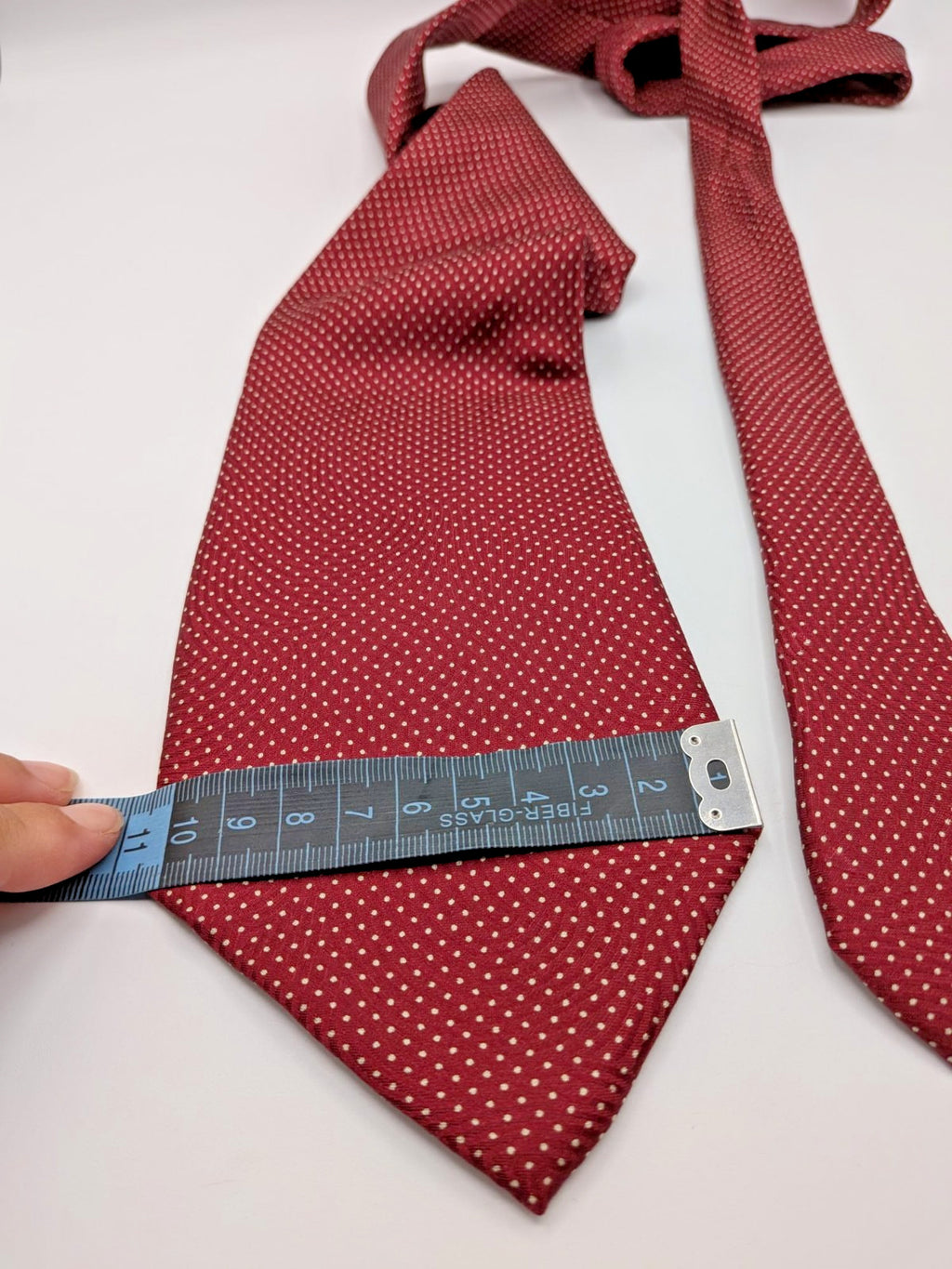 Bordeaux navy necktie 100% silk with cream polka dot pattern and original label.