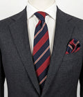 Blazer necktie navy with regimental diagonal stripes in blue, burgundy, white, and red.